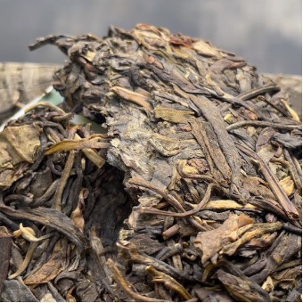 Зелёный шен пуэр Ча Шу Ван «Повелитель чайных деревьев» мини-блин 50г.